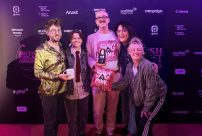 The Sing It Pink team celebrating their win at the British Podcast Awards